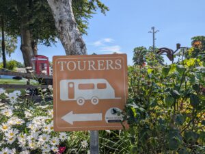 touring signpost at moss wood caravan park